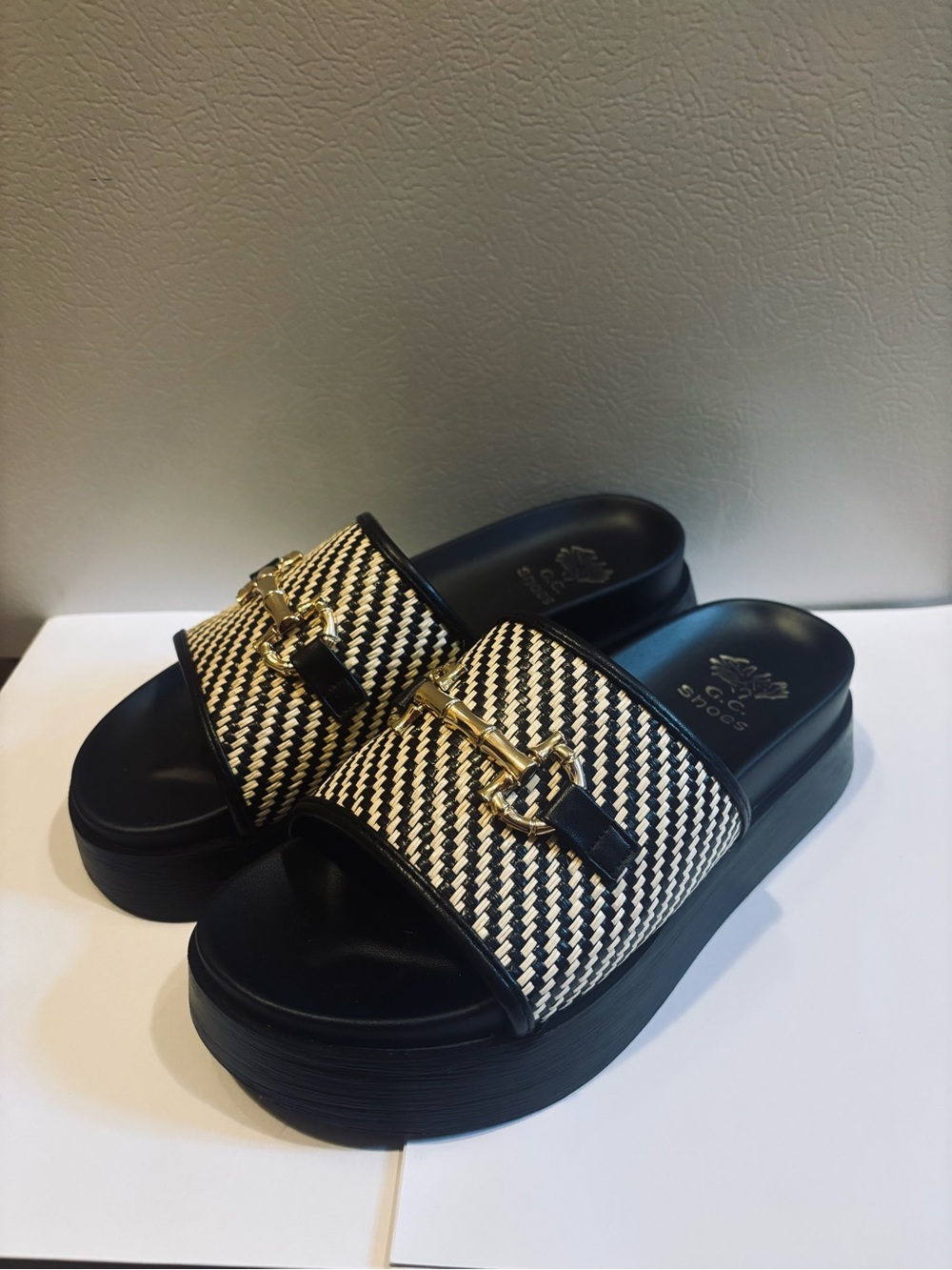 Woven Black-and-White Slide Mules with Gold Chain Detail